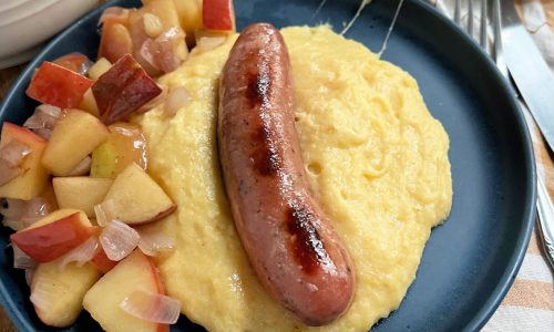 Recipe: Chicken and apple sausage with cheesy grits comes together in 10 minutes
