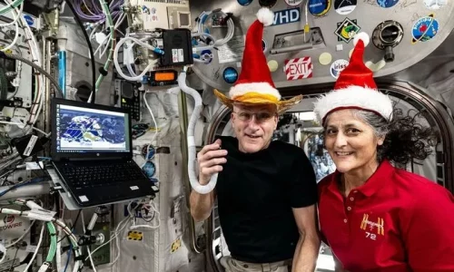 Stranded Astronauts Enjoy Christmas Dinner in Outer Space