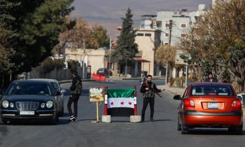 Syrian prime minister says government is still functioning but foreign and domestic challenges loom