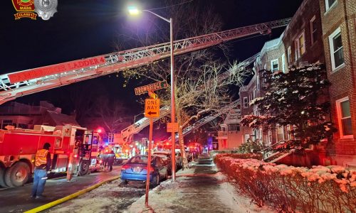 Massachusetts firefighters rescue trapped resident from 3rd floor window on bitterly cold night