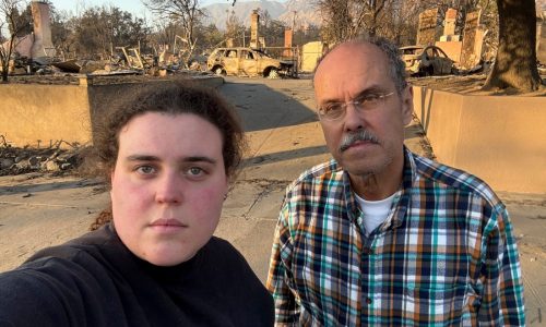 A dad and daughter help evacuees learn whether their homes survived the California wildfires