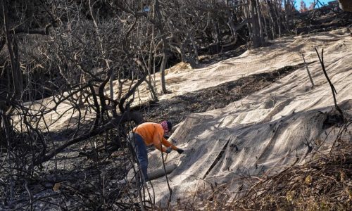 Rain in Southern California creates mudflows but helps firefighters