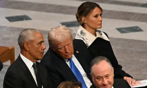 What’s that picture on Melania Trump’s collar at Jimmy Carter funeral?