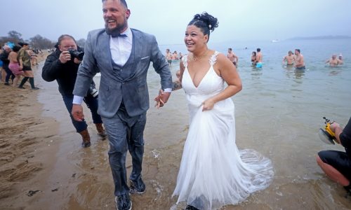 ‘Ready for 2025 now:’ Polar plungers take annual brisk dip in Boston Harbor