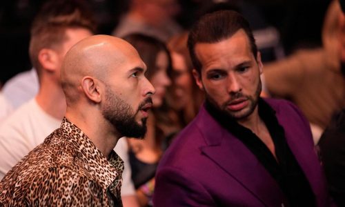 Andrew Tate, social media influencer who faces trafficking charges, sits cageside for UFC 313