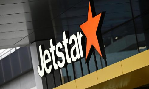 A boy with a loaded shotgun boarded a plane in Australia but was tackled by a former boxer