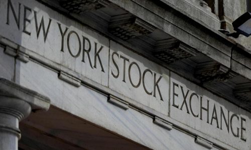 Global shares slump and gold hits a record high as investors fret over tariffs