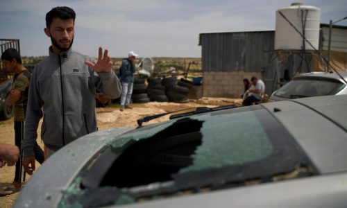 Wife of Oscar-winning Palestinian director says he was savagely beaten outside his home