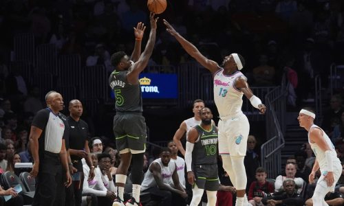 Despite late drama, Timberwolves edge Miami for fourth straight win