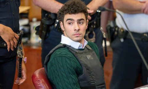 A heart-shaped note was found in socks bound for Luigi Mangione, prosecutors say