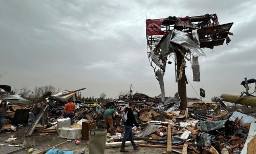 Monster storm across the US sparks scores of tornadoes and fire, killing at least 17