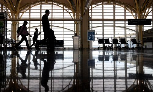 The wing tip of an American Airlines plane strikes another aircraft at a DC airport