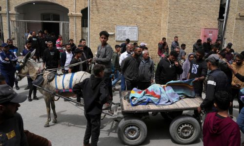 Israeli strike on Gaza apartment building kills at least 23, officials say