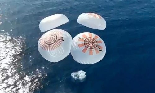 Four space tourists return to Earth after a private flight over the poles