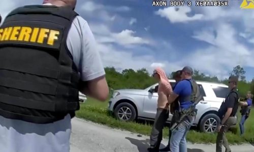 Florida brings charges against a man jailed on federal counts of trying to assassinate Trump