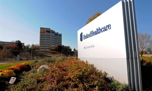 Man arrested outside UnitedHealthcare is now charged with firearms counts and threatening violence