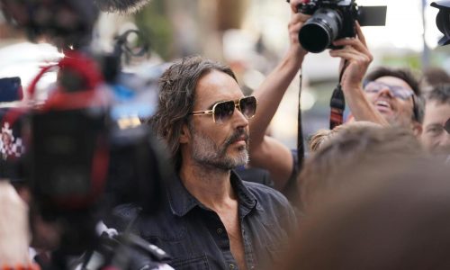 Russell Brand granted conditional bail after appearing in London court on rape and assault charges