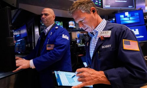Wall Street loses ground and oil prices tumble after OPEC+ says it will step up production