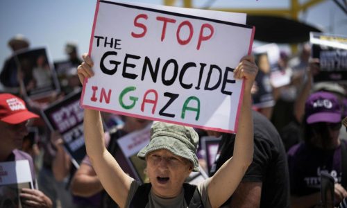 At least 60 people killed by Israeli strikes in Gaza as Israel lets minimal aid in