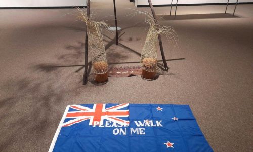 A controversial flag invited art gallery visitors to ‘please walk on me.’ It lasted 19 days