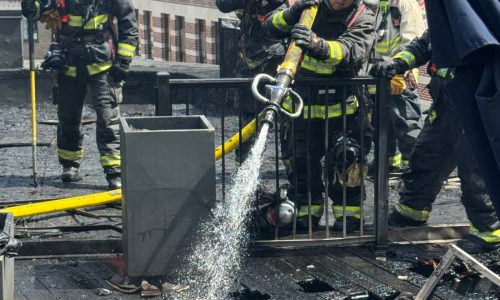 2-alarm fire scorches roof of downtown building