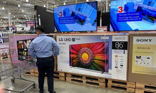 Key inflation gauge rose last month while Americans cut back on spending