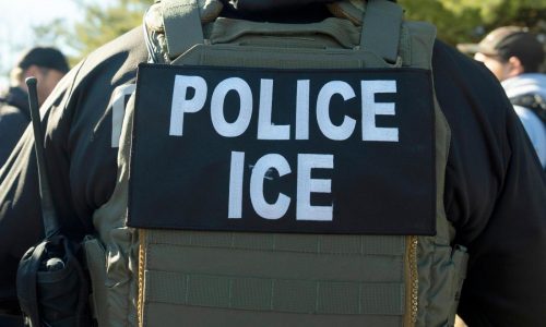 Migrants and ICE officers contend with heat, smog and illness after detoured South Sudan flight