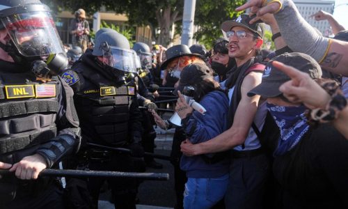 Trump vows to ‘HIT’ any protester who spits on police. He pardoned those who did far worse on Jan. 6