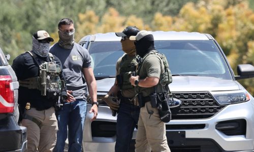 Masked immigration officers aren’t always telling SoCal police about raids. Some fear it’s creating ‘dangerous situations’