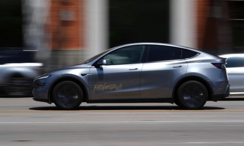 Musk’s ‘robotaxis’ draw regulatory scrutiny after video shows one driving in an opposing lane