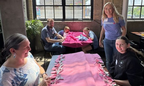 Volunteers make 100 blankets in St. Paul for homeless outreach event