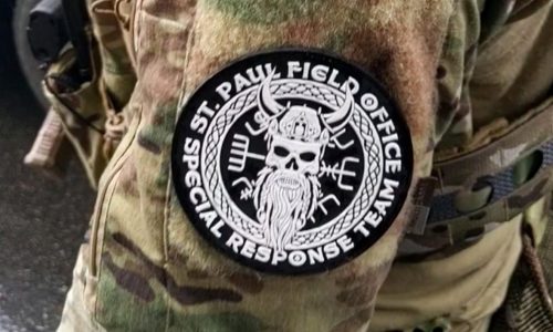 Officers in Minneapolis raid wore distinct patches. One was authorized, another wasn’t, feds say.