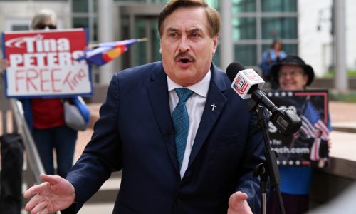 As trial opens, Mike Lindell’s attorneys say he spread claims about Dominion official because he was ‘triggered’