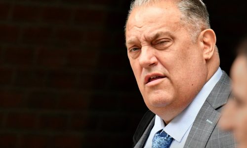 Ex-Massachusetts State Police union president, lobbyist get some convictions reversed