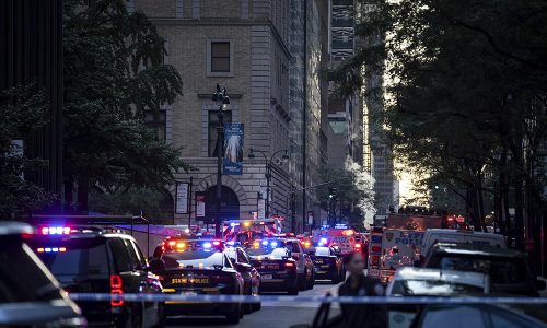 At least 5 people, including a police officer, killed in a Manhattan office building shooting