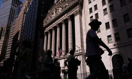 Wall Street drifts as Tesla drops and yields rise following economic updates