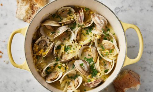 Crème fraîche creates a creamy broth in this recipe for briny-sweet steamed clams