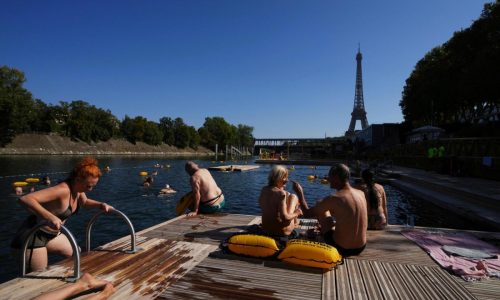 The Seine in Paris is open for swimming. Tourists and residents embrace it as temperatures soar