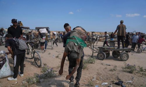 Dozens killed as Palestinians in Gaza scramble for aid from air and land