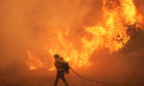 Scientists give harsh grades to Trump administration work aimed at undoing a key climate finding