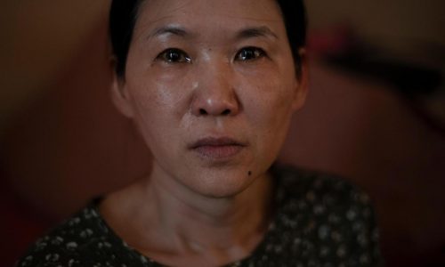 Woman seeks compensation from South Korea over her forced adoption to France in 1984