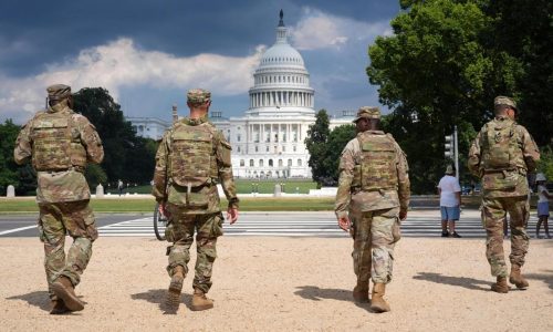 National Guard vehicle collides with civilian car near US Capitol, trapping one person