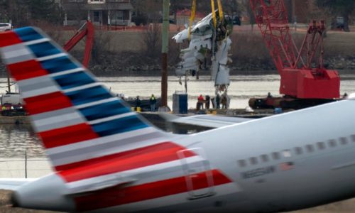 Family of 1 of the 67 Washington plane crash victims sues the FAA, Army and American Airlines