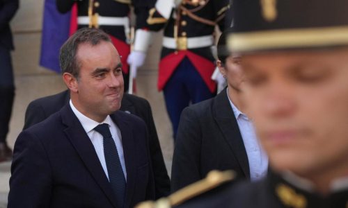 Strikes and protests roil France, pitting the streets against Macron and his new prime minister