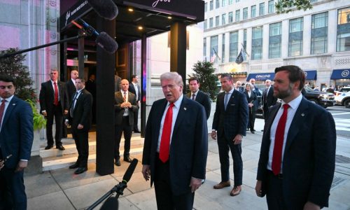 Trump having dinner at a restaurant near the White House to promote his Washington crackdown