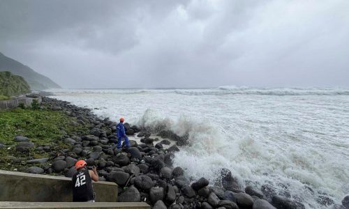 Super typhoon blowing by northern Philippines and Taiwan forces evacuations and closures
