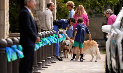 Hundreds mourn 8-year-old Fletcher Merkel, who was killed in a mass shooting at a Minneapolis church