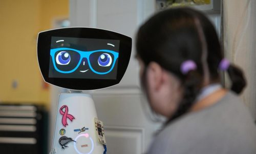A robot programmed to act like a 7-year-old girl works to combat fear and loneliness in hospitals