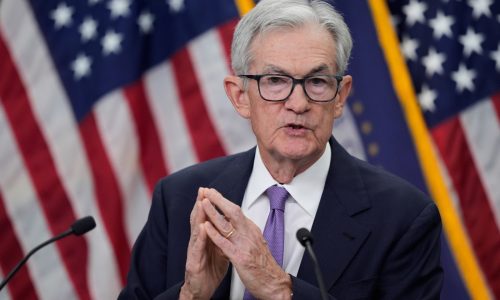 Fed cuts key rate