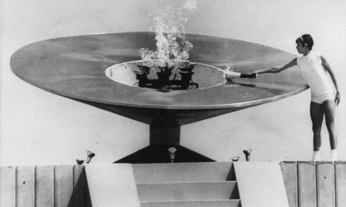 Today in History: October 12, First woman lights Olympic flame